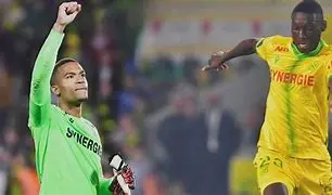 Image of Alban Lafont : Gardien d'Élite et Espoir du Football Français